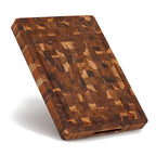 Thick teak wood chopping block with end grain construction