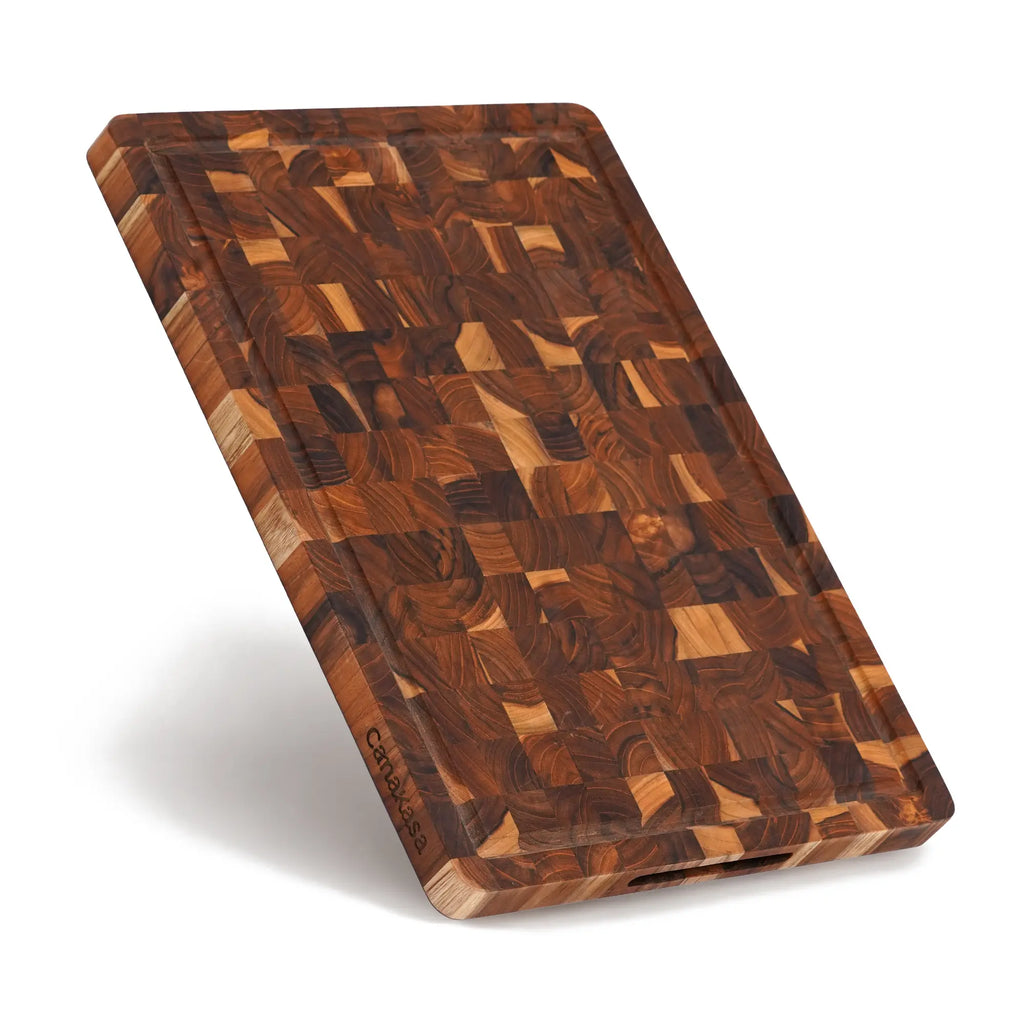 Teak wood cutting board with dual handles and end grain surface